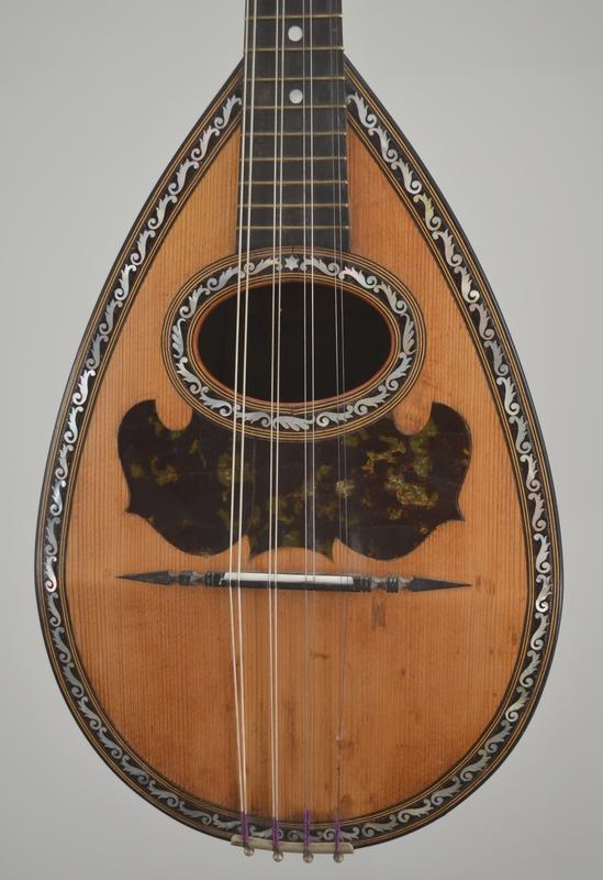 MANDOLIN BY TIERI NAPOLI, More Informations...